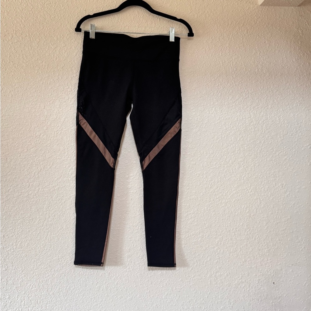 Fabletics Black Leggings with gold and mesh Accents